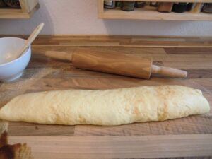 Cinnamon Roll Teig zusammen gerollt
